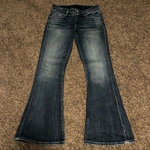 Like New Buckle Black Mid Rise Flare Jeans